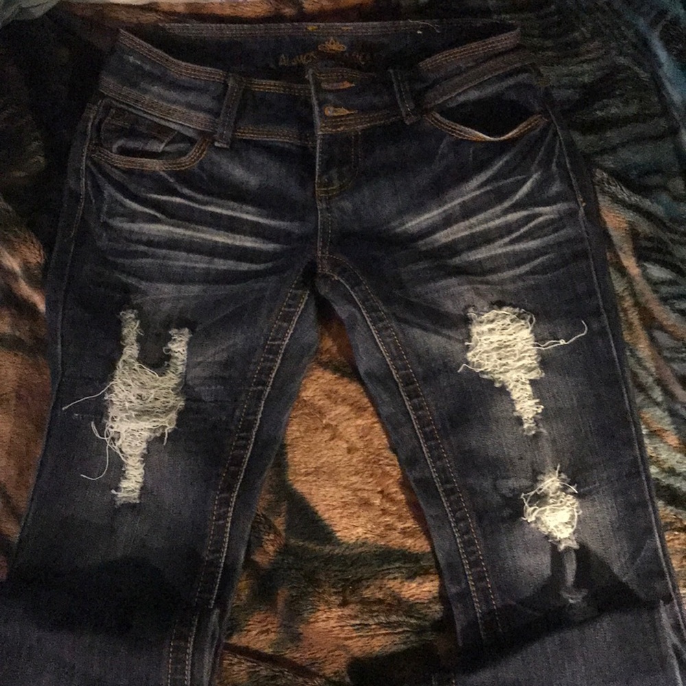 Like new Almost famous jeans size 5